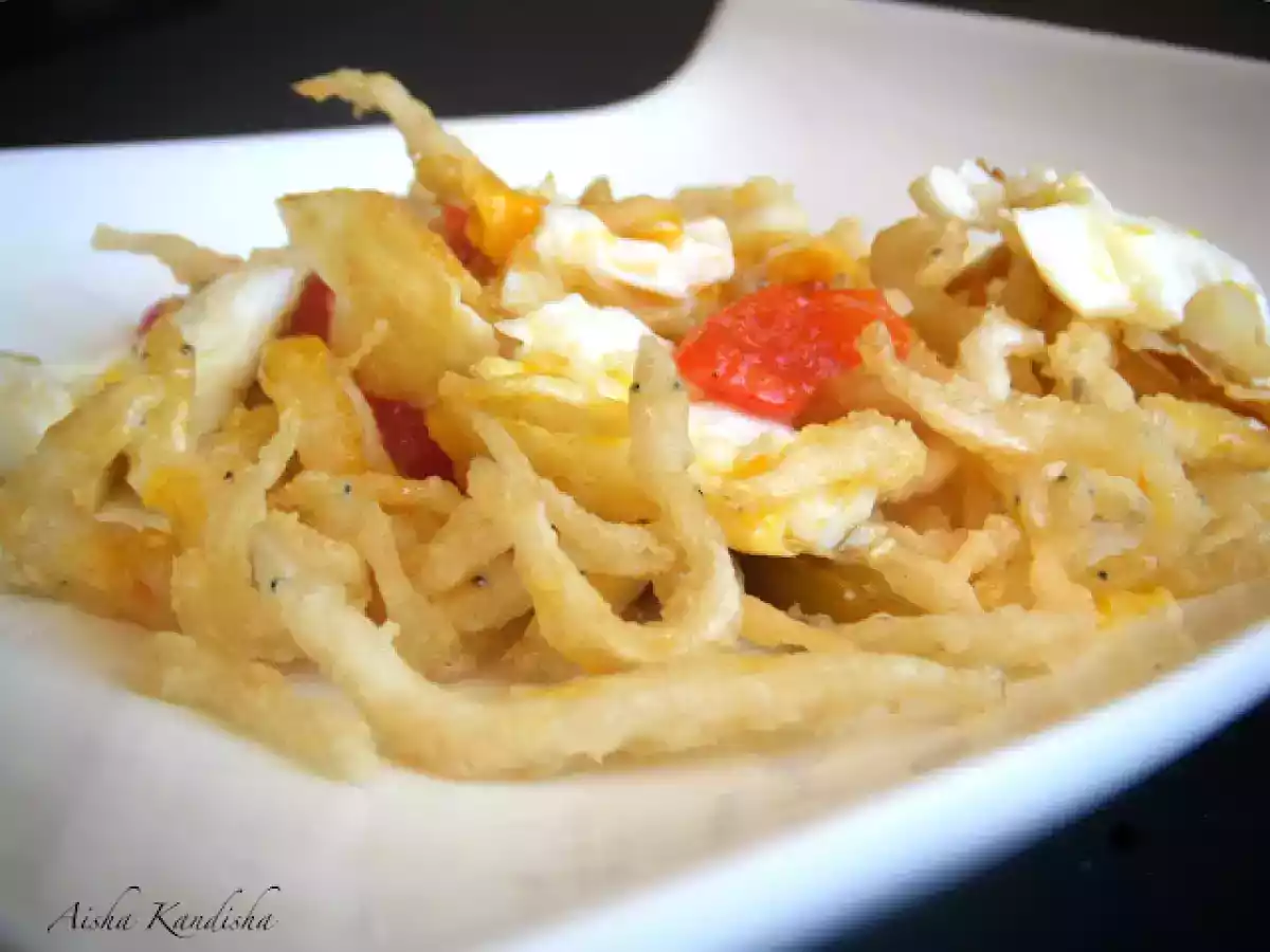 Chanquetes con pimientos asados y huevos fritos