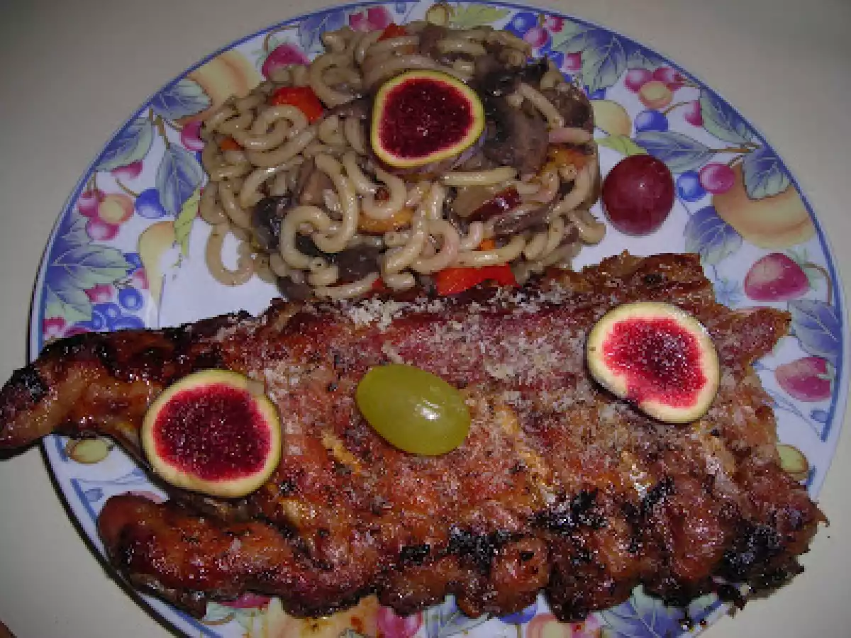 Costillas de cerdo asadas con coco y fideua de higos