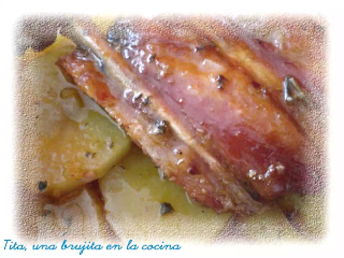 Costillas ibéricas adobadas en cama de patatas