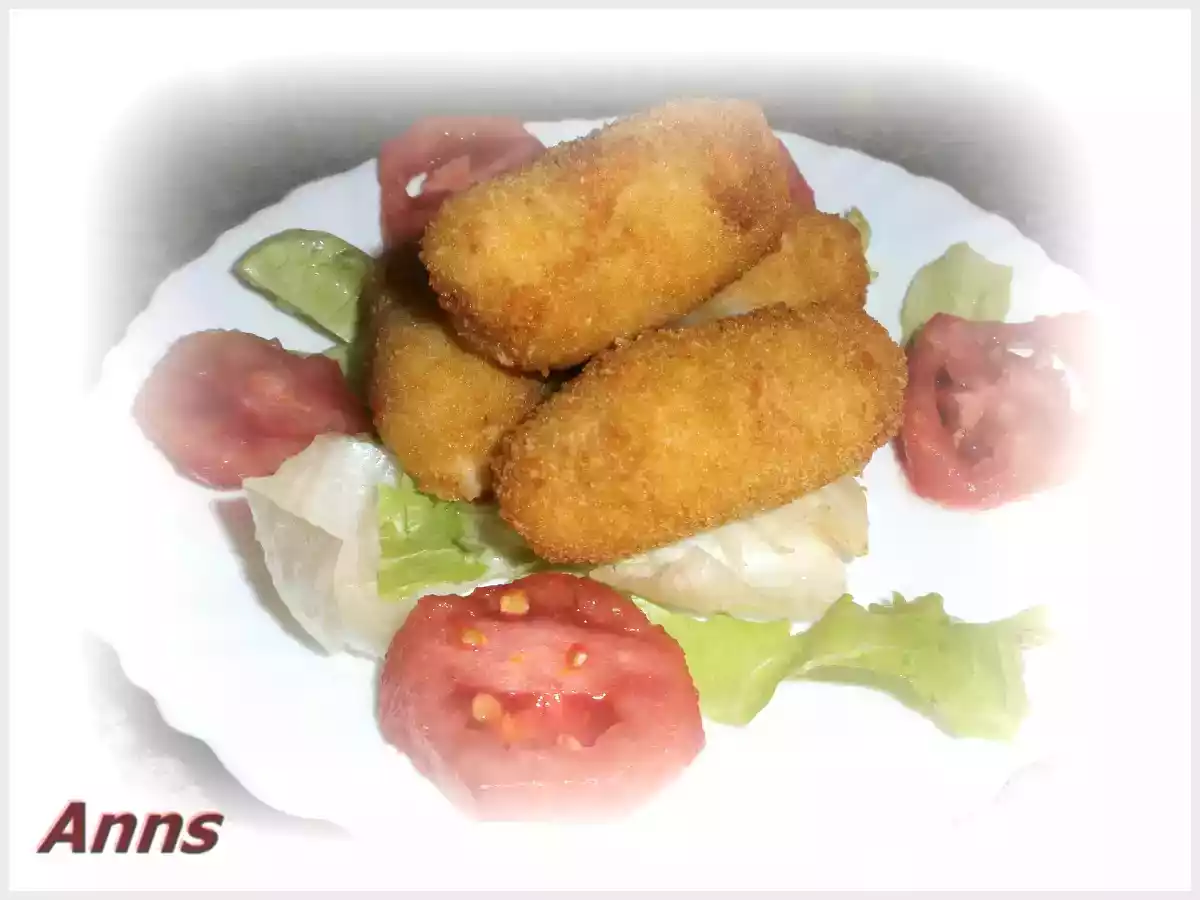 Croquetas de salmón, atún y piñones