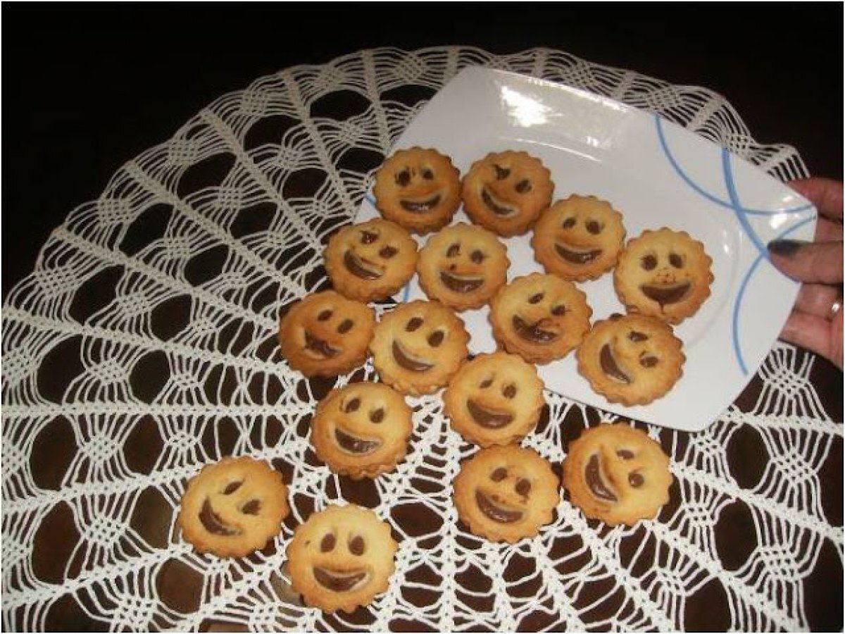 Galletas de caritas con chocolate Receta