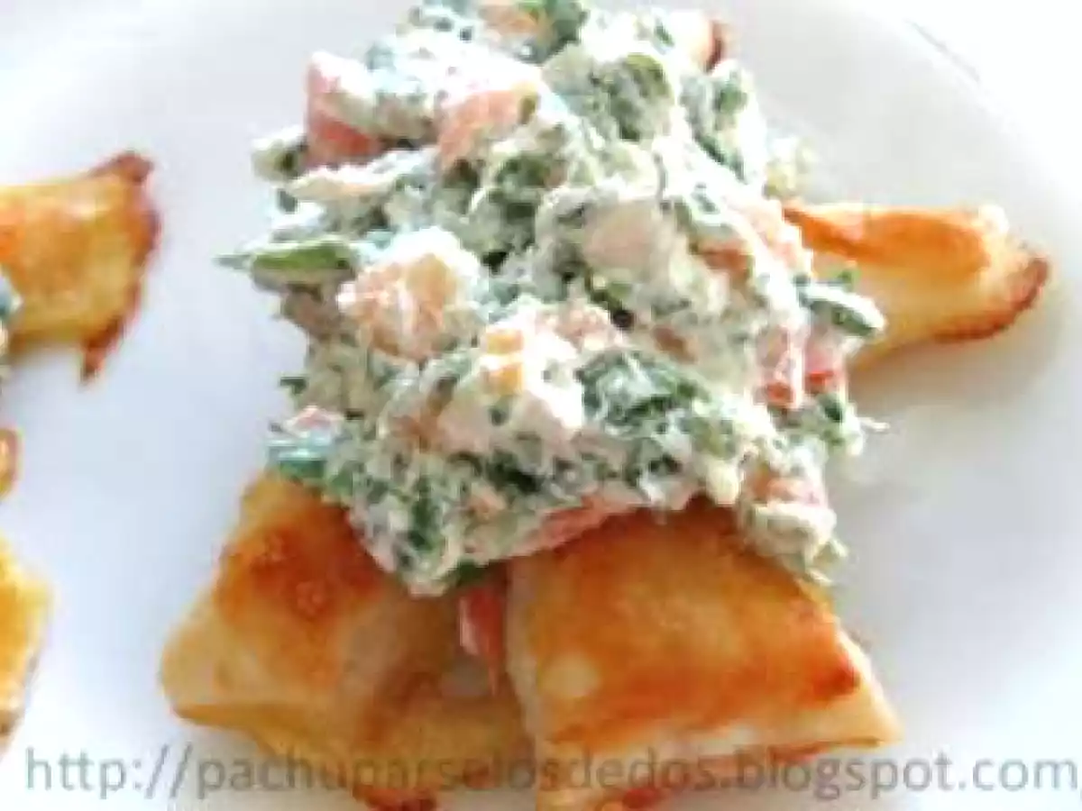 Hojaldre con rúcula, tomate y queso