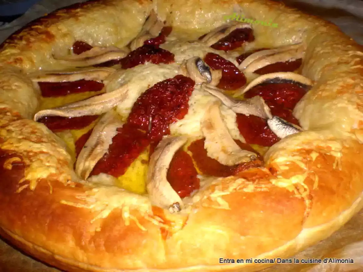 Hojaldre tomates secos-boquerones en vinagre