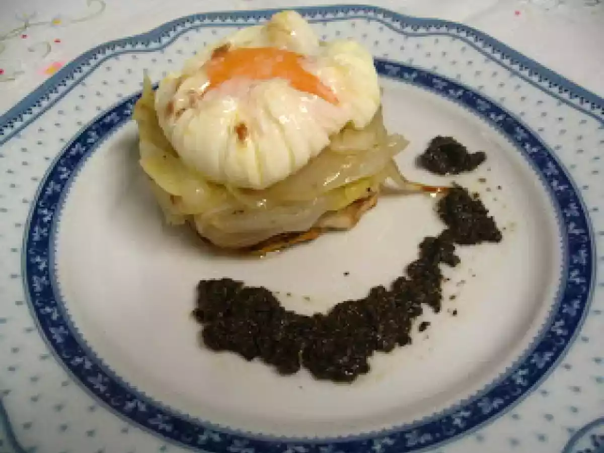 HUEVOS ESCALFADOS CON AROMA DE AJOS Y SALSA TARTUFADA