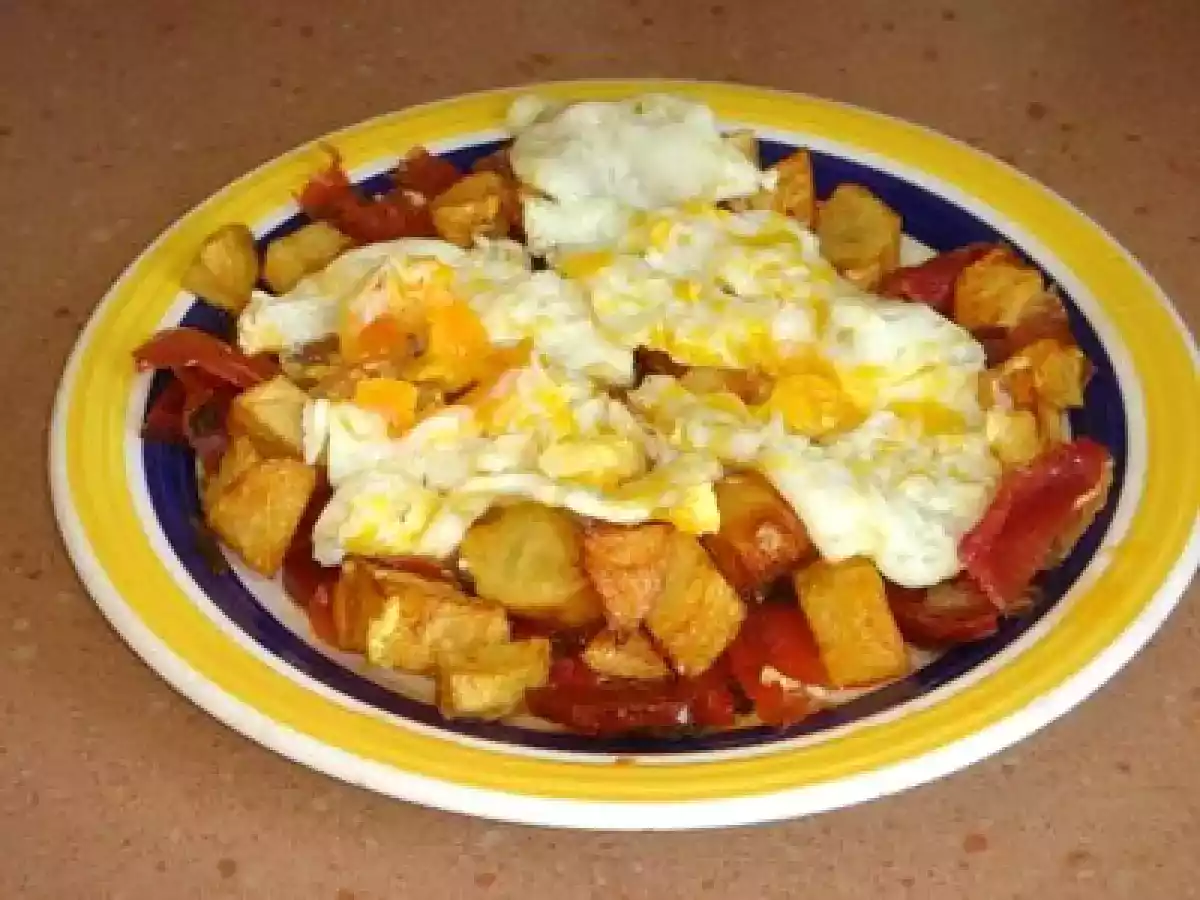 Huevos rotos con jamón