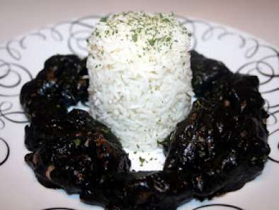 Jibiones en tinta y arroz