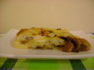 Lasagna con hongos y scamorza ahumada