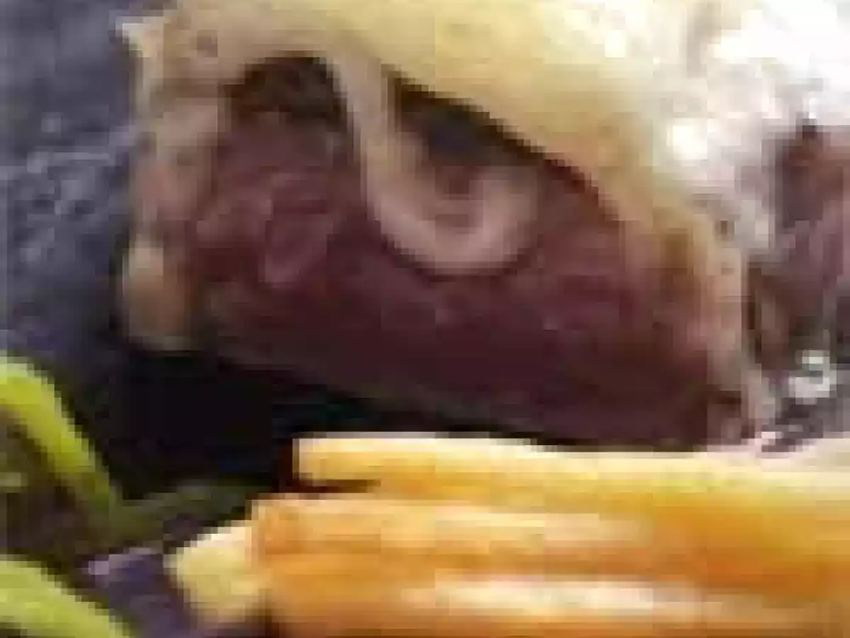 Lomo de ternera con cebollitas y crema de queso payoyo