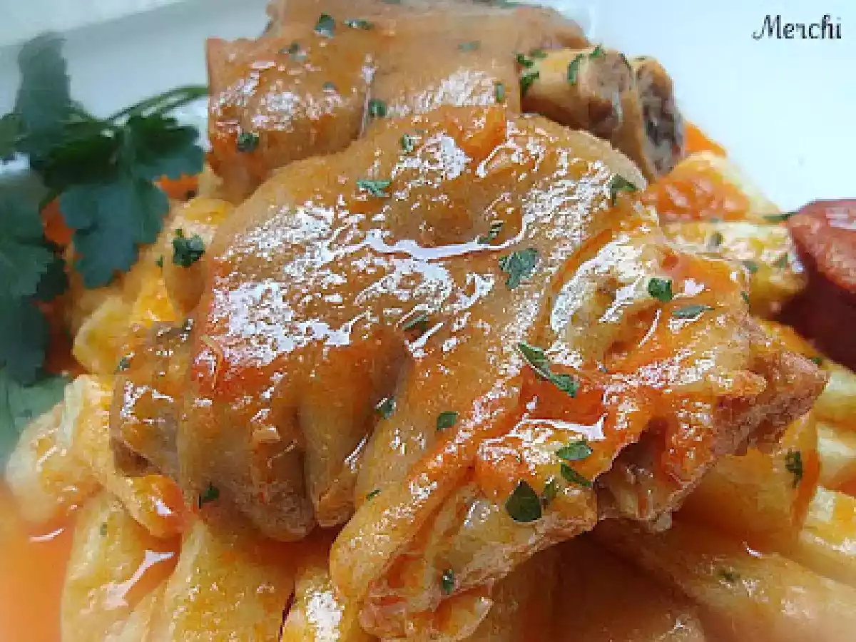 Manitas de cerdo en salsa - foto 3