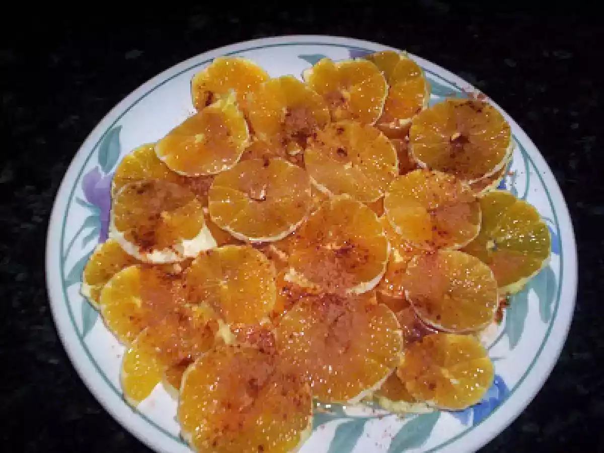 Naranjas con azúcar y canela.
