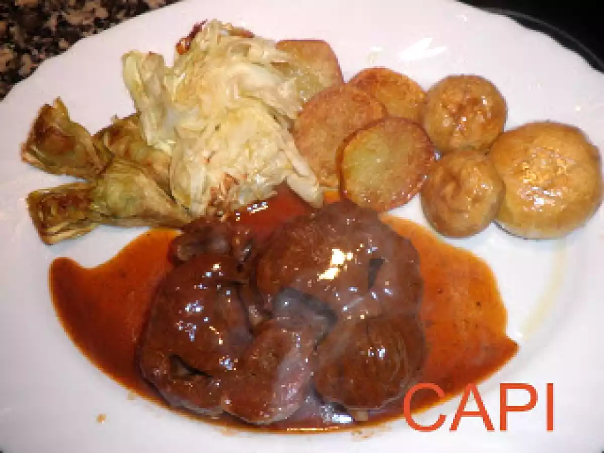 OSSOBUCO DE CERDO EN SALSA (de vermut, naranja, tomillo y demás)