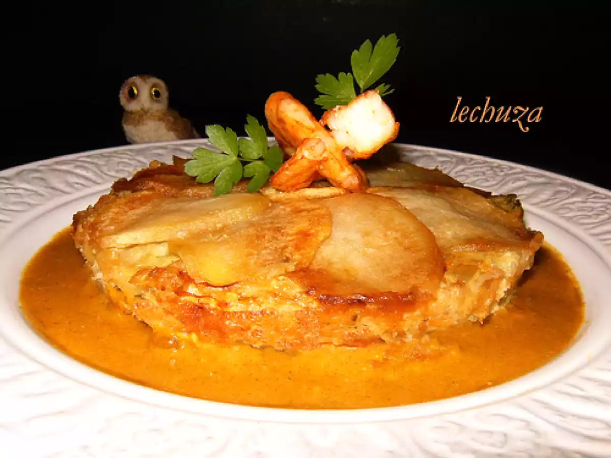 Pasteles de bertorella y marisco en salsa de mejillones