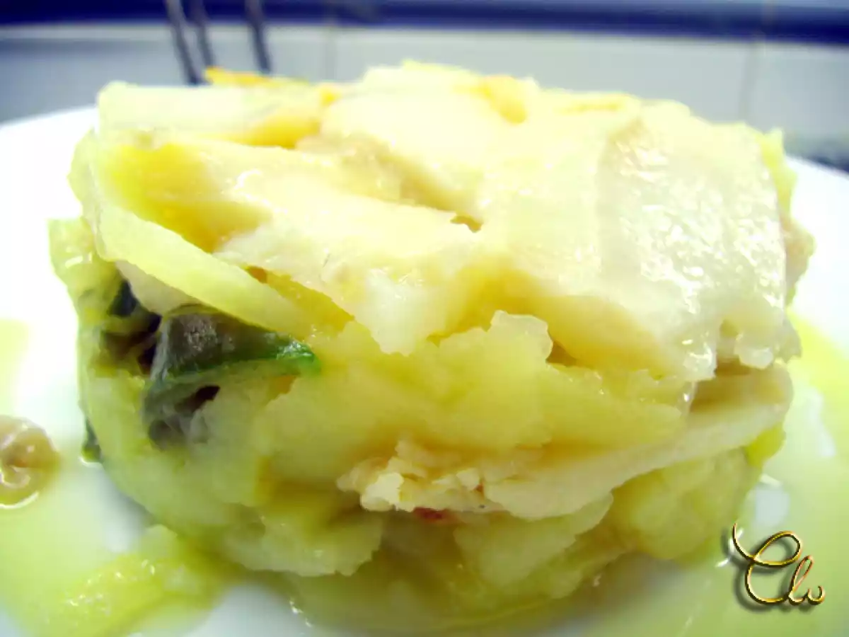 Patatas a lo pobre con bacalao confitado