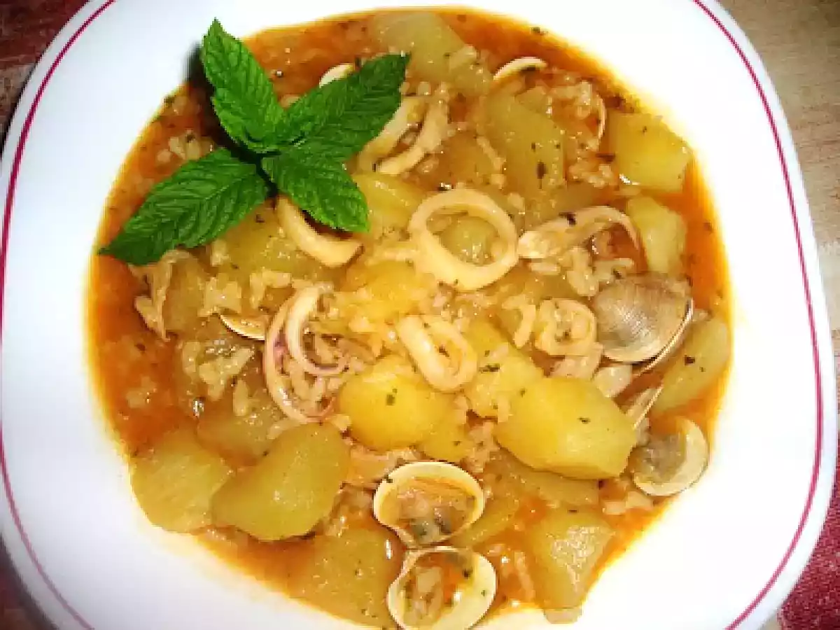 Patatas con chirlas y calamar - foto 2