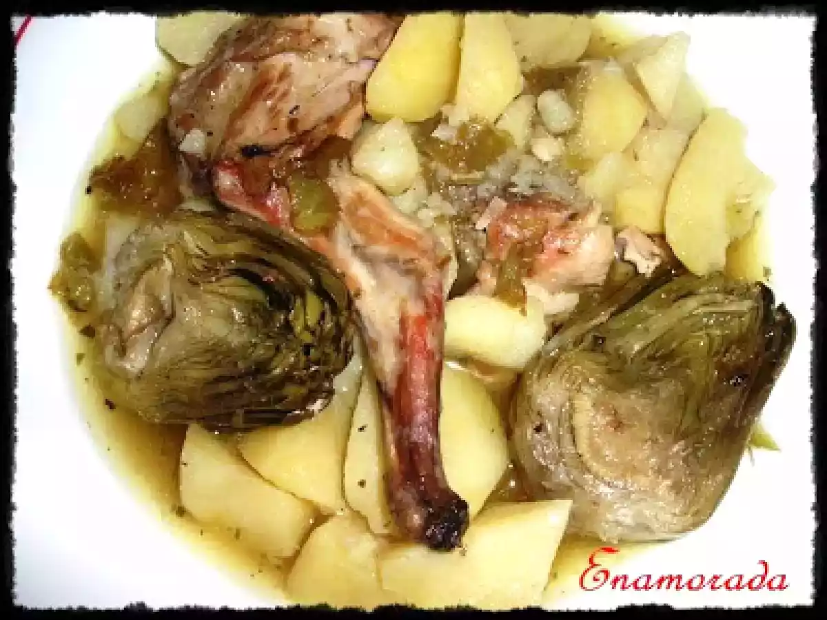 Patatas con conejo y alcachofas