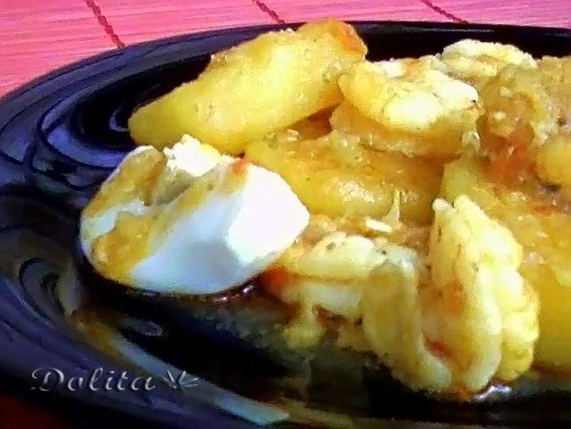 Patatas con langostinos al curry