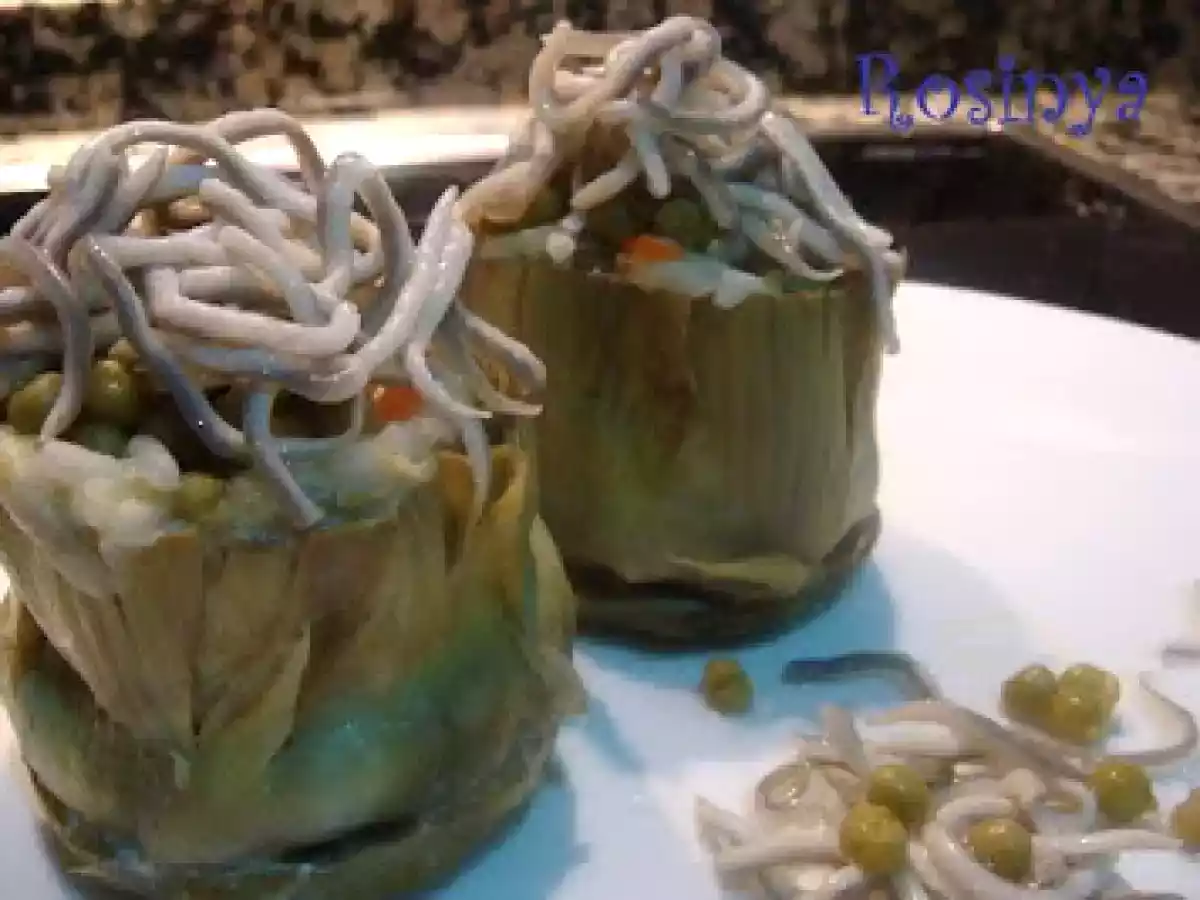 PECADO CAPITAL AL AJILLO SOBRE ALCACHOFAS RELLENAS