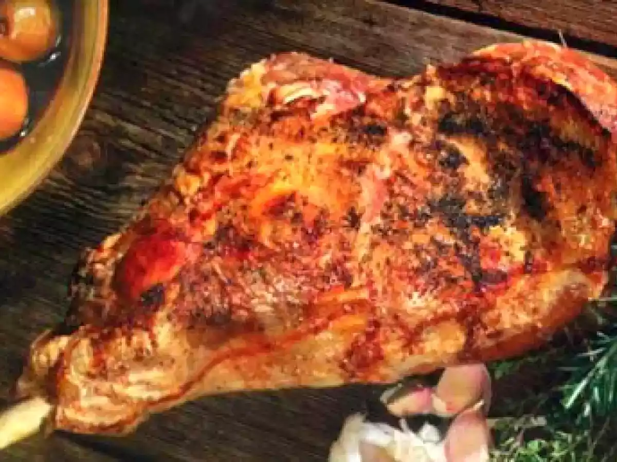 Pierna de cordero asada con guarnición