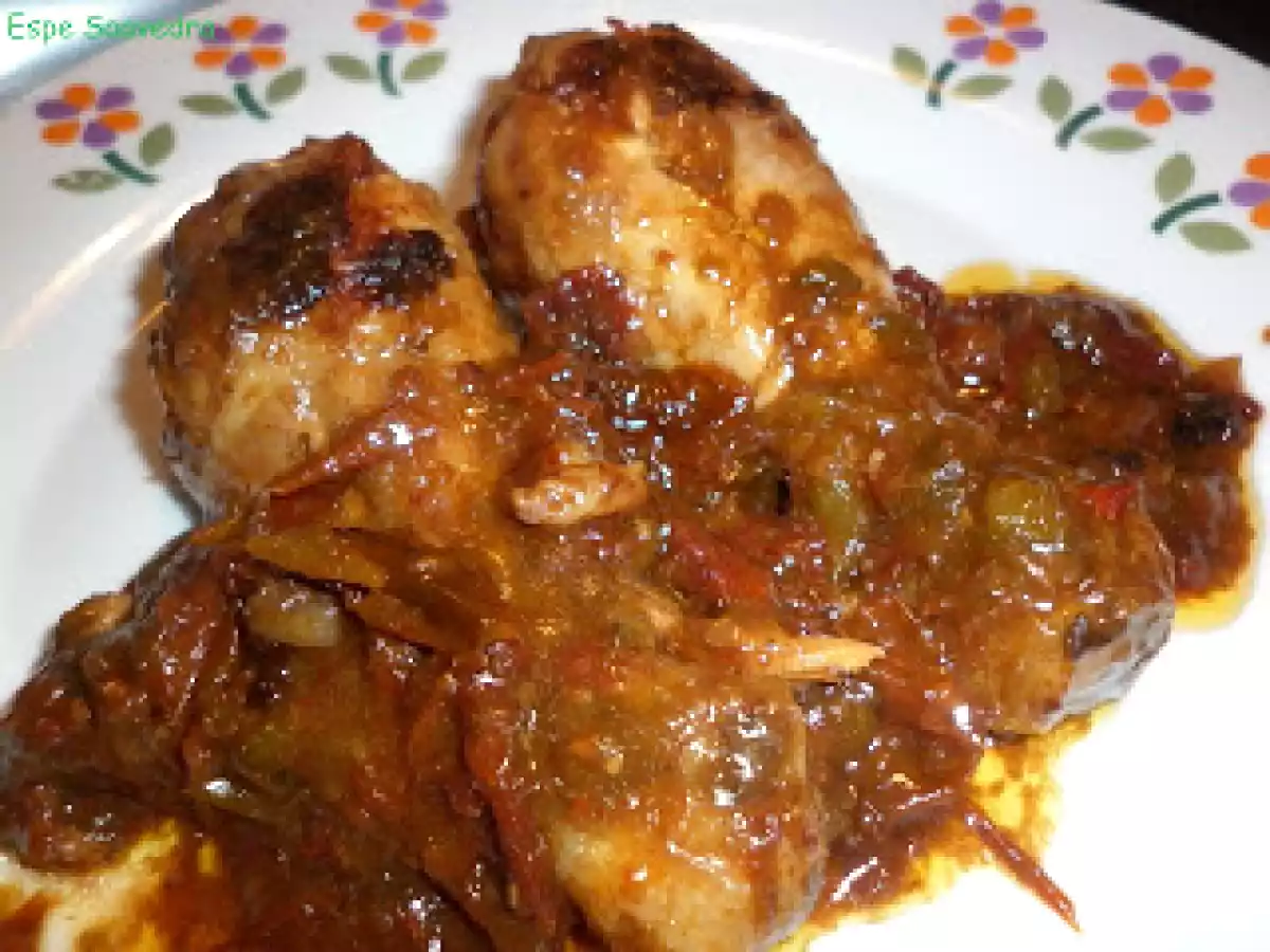 Pollo con pimientos y tomates