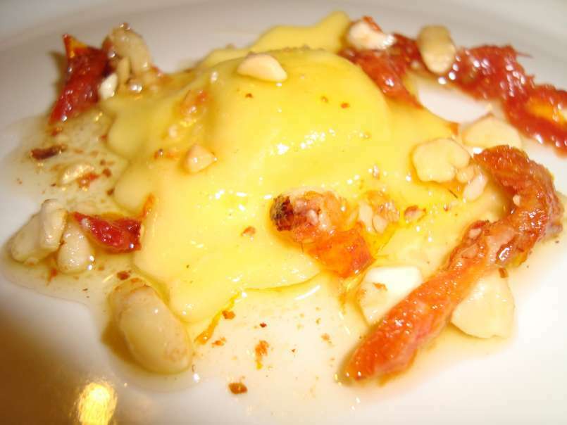 Raviolis de queso manchego con pesto de tomate y frutos secos