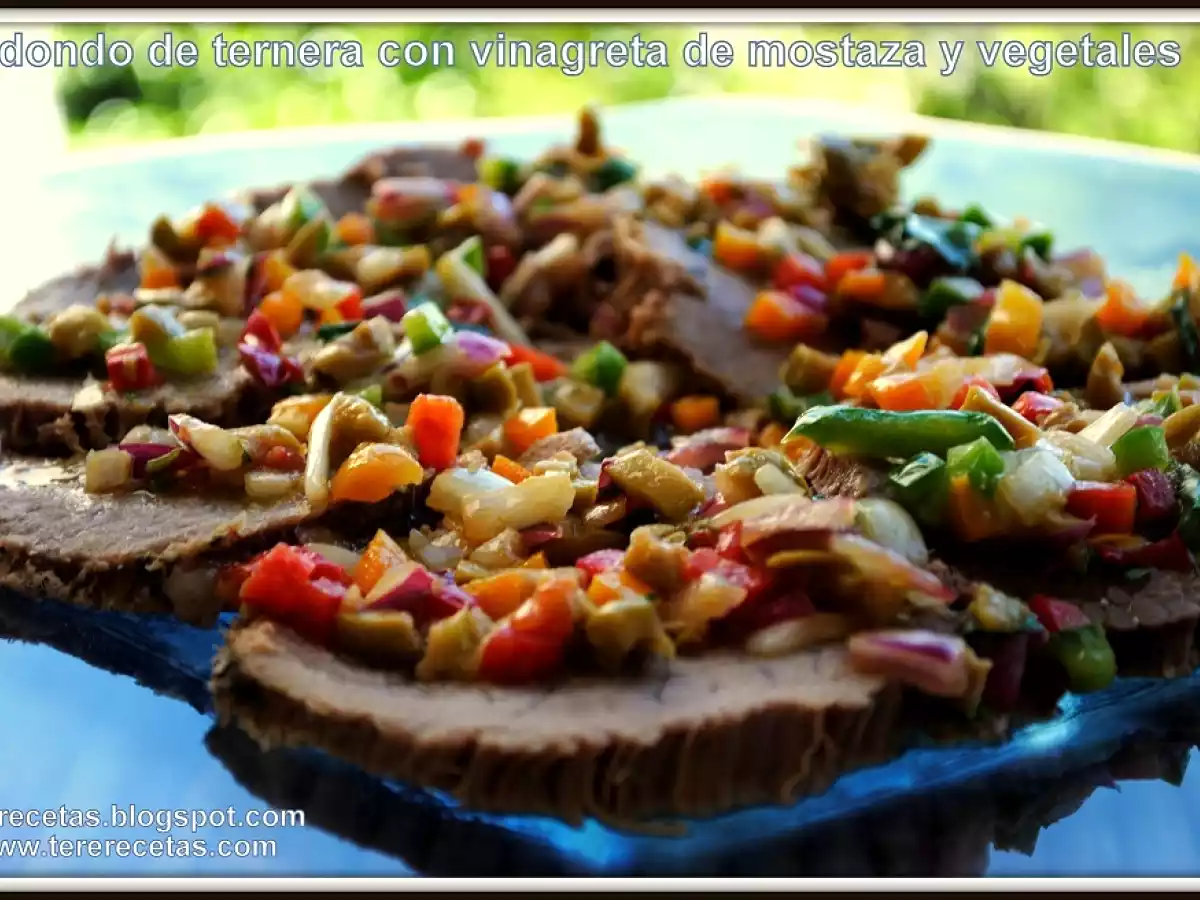 Redondo de ternera con vinagreta de mostaza y vegetales.