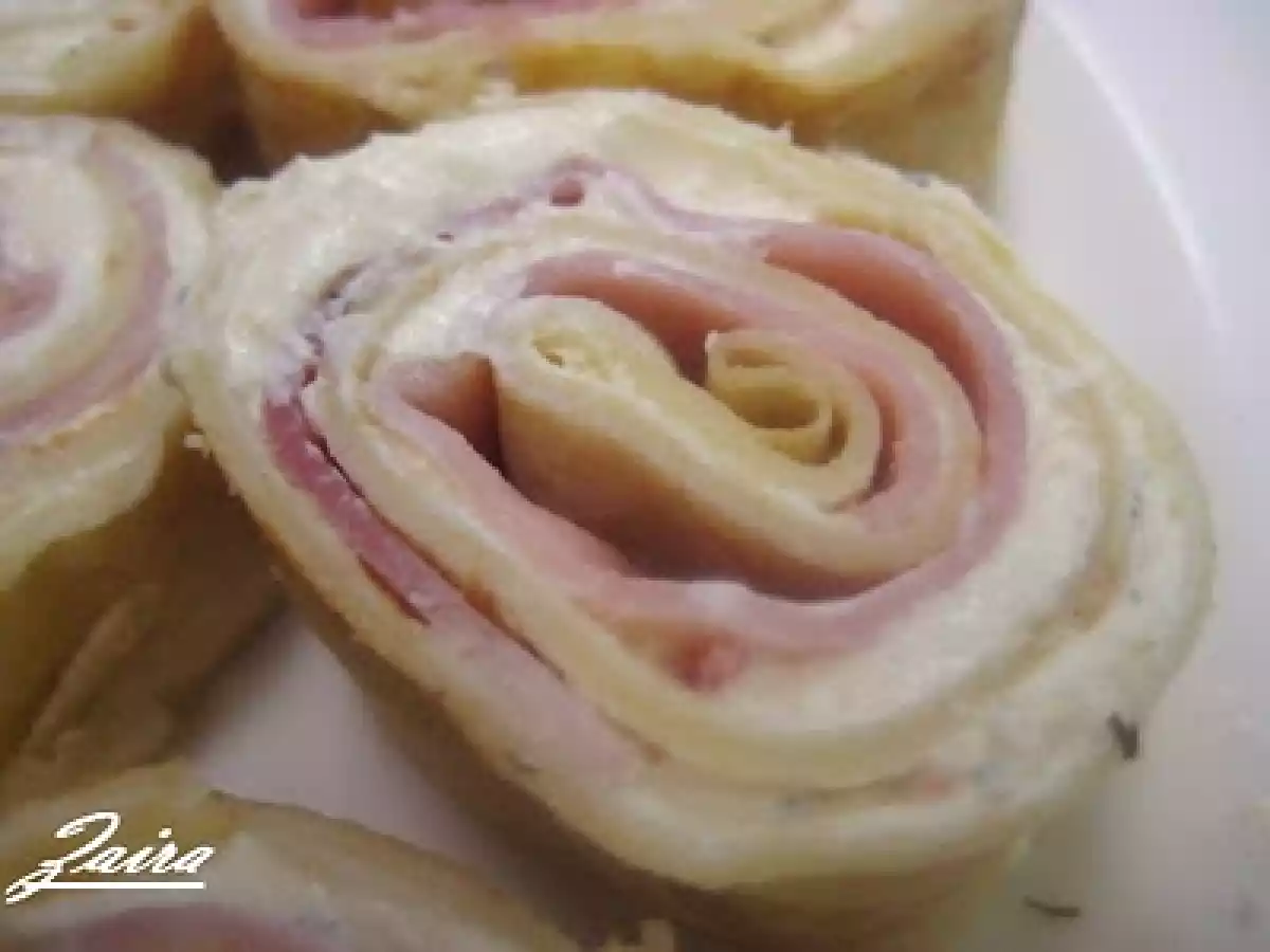 Rollitos de crepes con jamón y queso