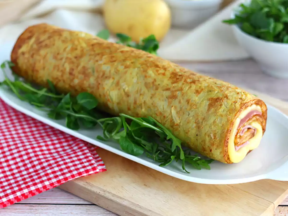 Rollo de tortilla de patatas relleno de jamón y queso - foto 2