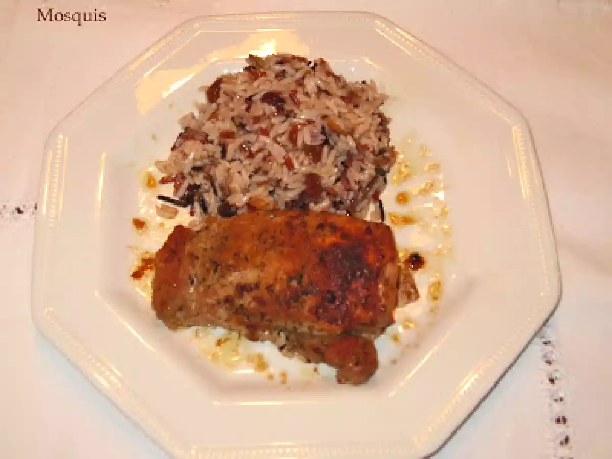 Solomillo de cerdo ibérico con guarnición de arroz y pasas