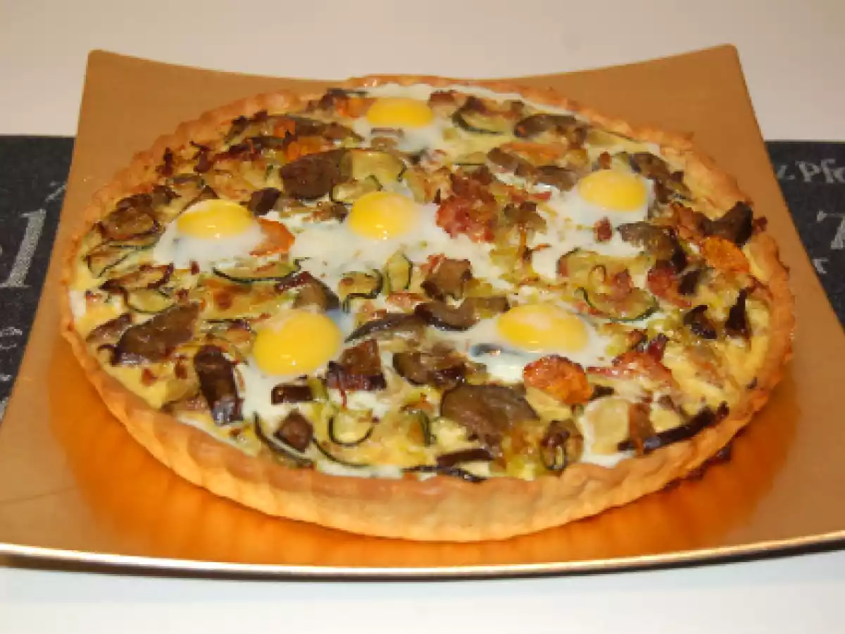 Tartaleta de verduras con huevos de codorniz