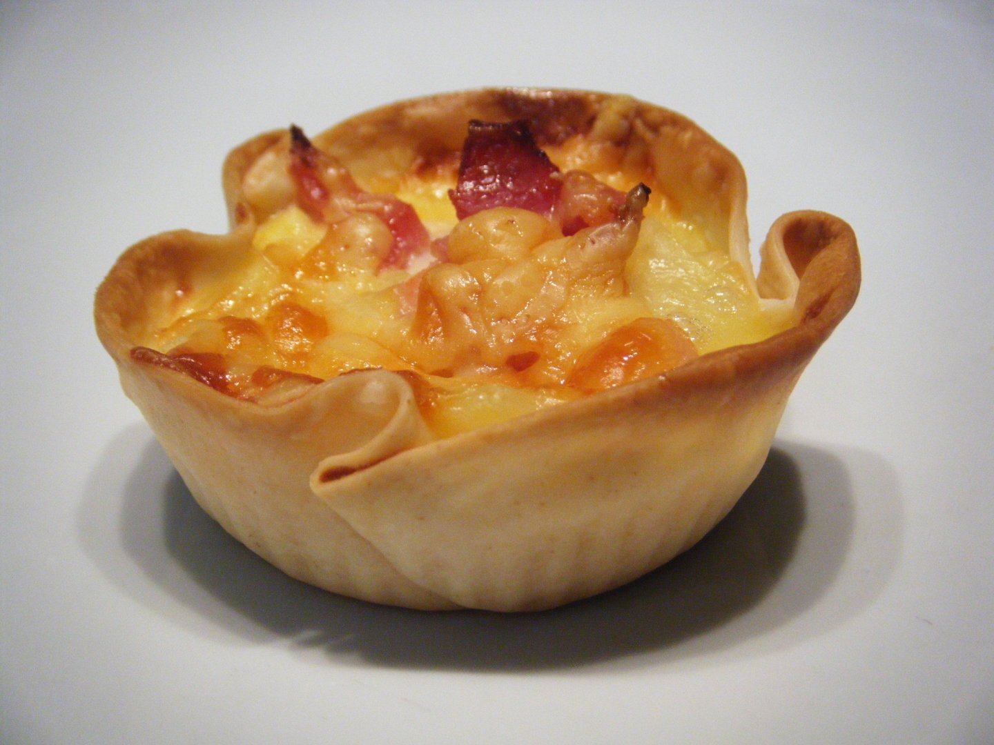 Tartaletas de tortilla con bacon y queso Receta Petitchef