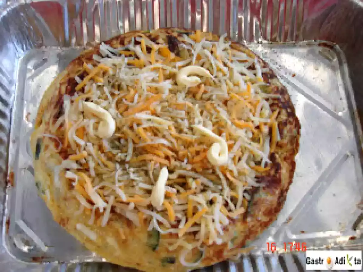 Tortilla de calabacín y cebolla gratinada a las finas hierbas