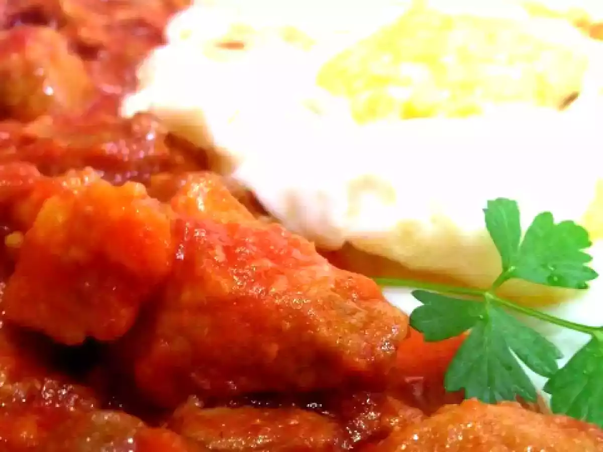 Una tapa de Carne con tomate ...